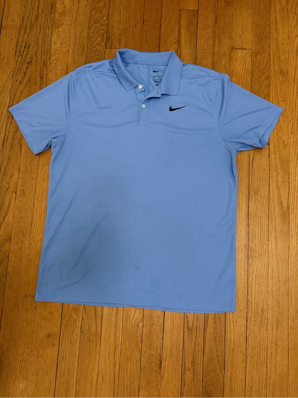 Nike Dri-Fit Men’s Sky Blue Polo Shirt with Black Swoosh - Size L